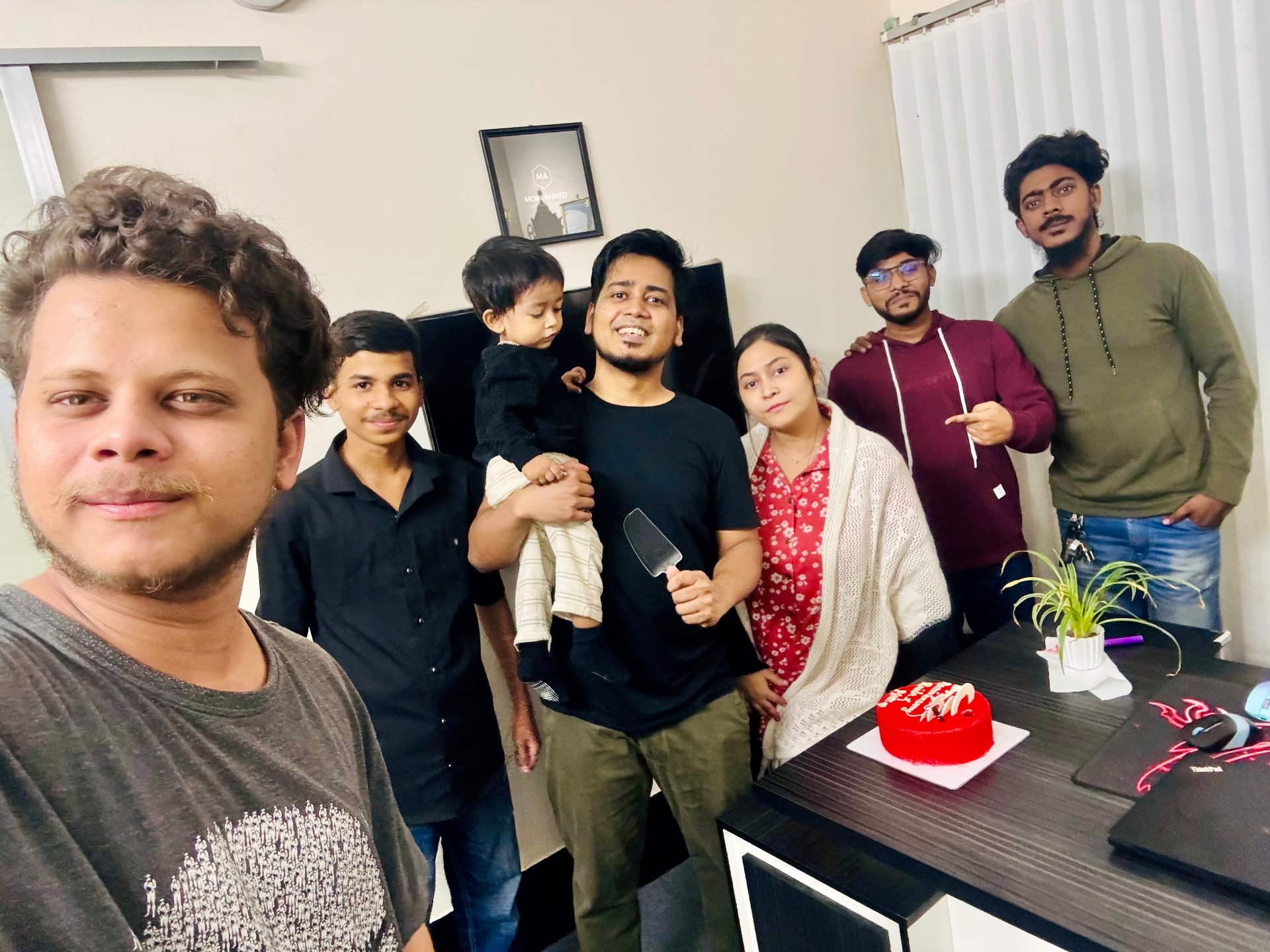 SkyByte team celebrating a birthday at the office