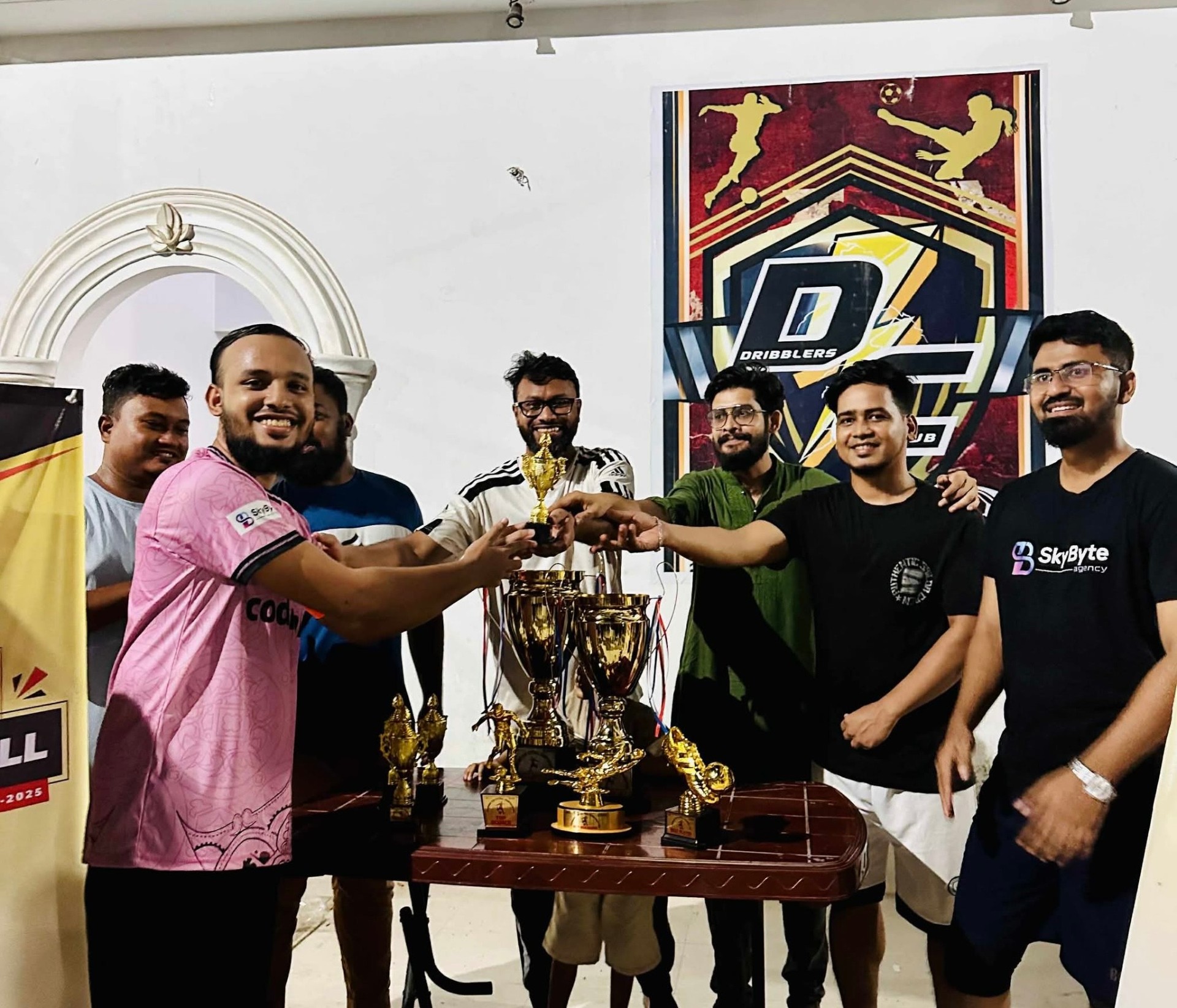 SkyByte team with sports trophies